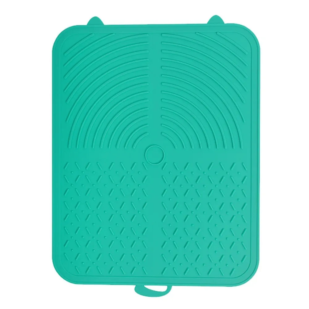 Tapis Nidofé Pause turquoise vu de dessus, avec zones texturées et deux petites oreilles.