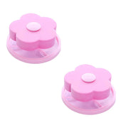 Deux filtres Nidofé Écume roses, avec dessus en forme de fleur et filets circulaires.
