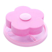 Filtre Nidofé Écume rose, avec dessus en forme de fleur et filet circulaire.