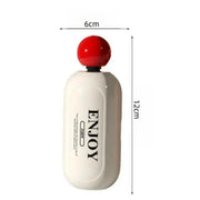 Mini rouleau Nidofé Élan blanc et rouge, avec dimensions indiquées de 6 × 12 cm.