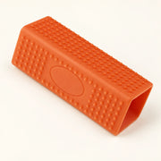 Brosse compacte orange à picots — vue studio illustrative